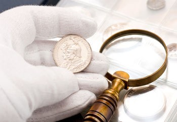 Cotton gloves, magnifier, cleaning dip for gold coins, etc.